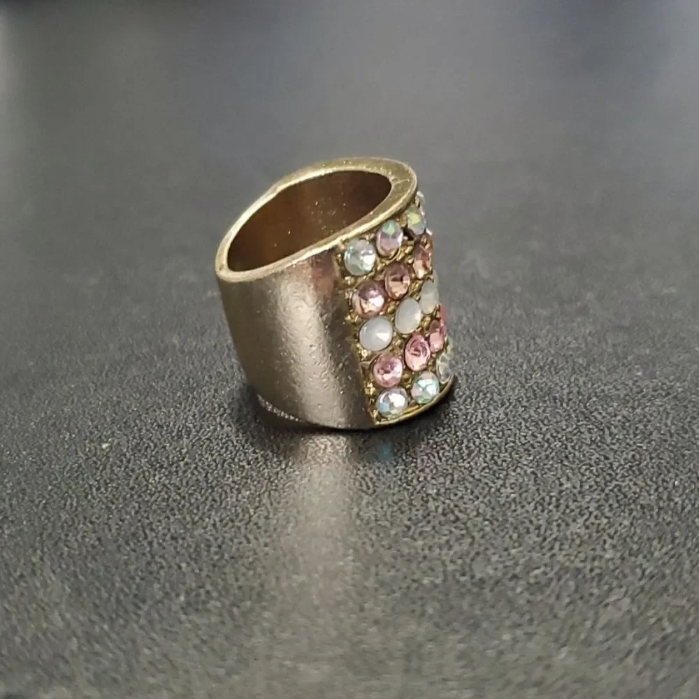 Gold tone wide rhinestone ring - Approx 5 pink chunky